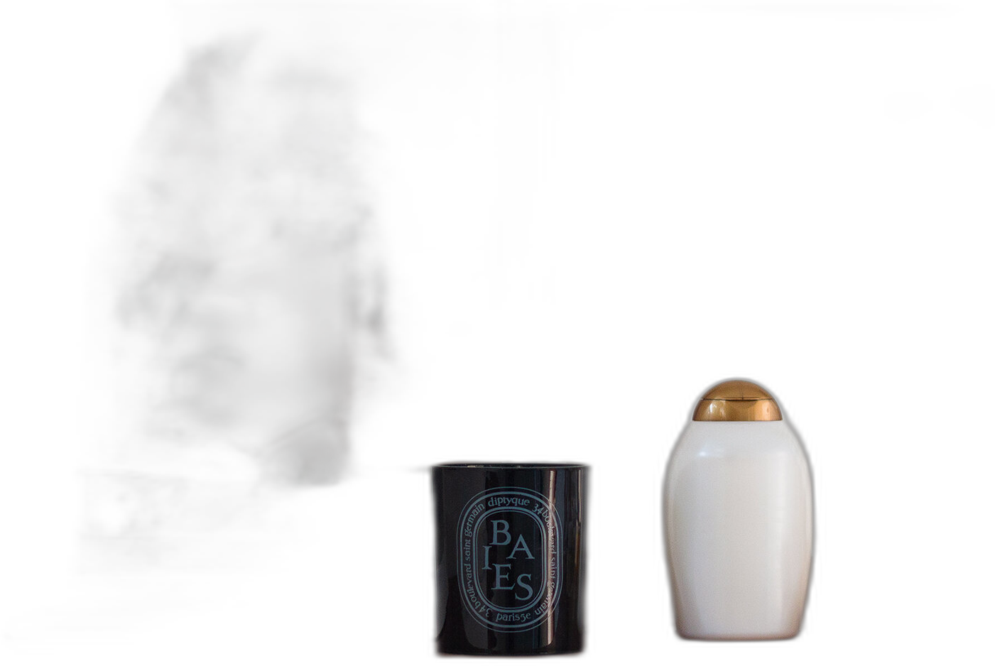 The Diptyque Baies candle sitting in the bathroom.