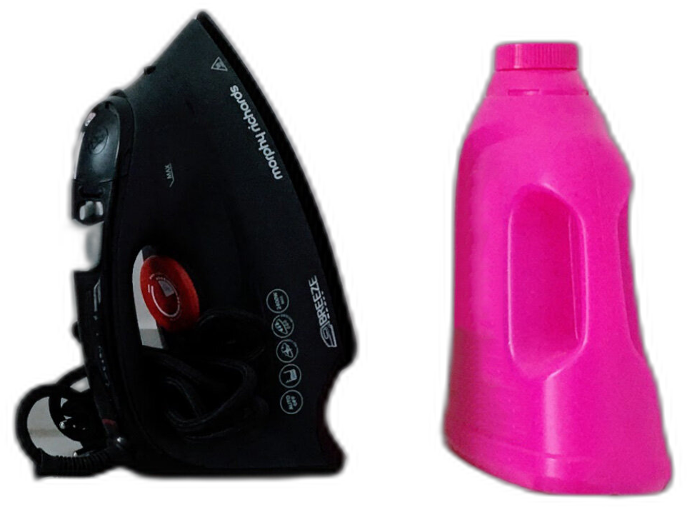 The iron on the shelf in the bathroom.